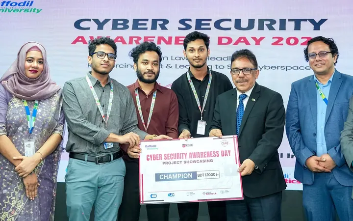 Cortex Crew receiving the Champion prize cheque on stage at Cyber Security Awareness Day 2026, Daffodil International University